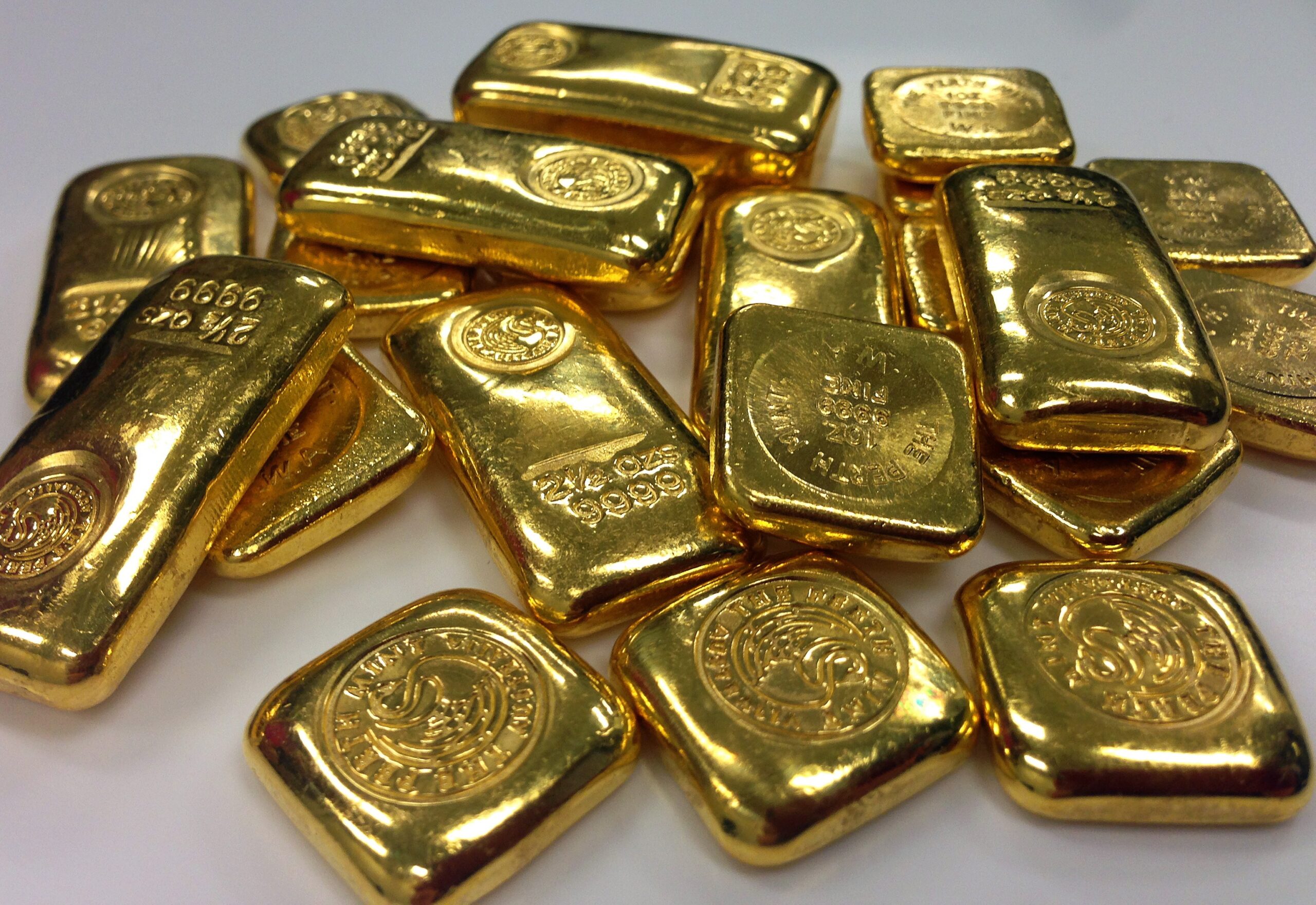 Stack of gold bullion bars representing the value of gold for sellers in Burbank